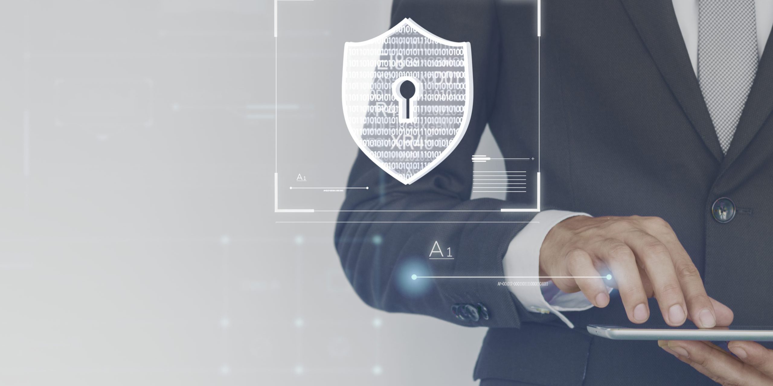 Businessman logging in to his tablet